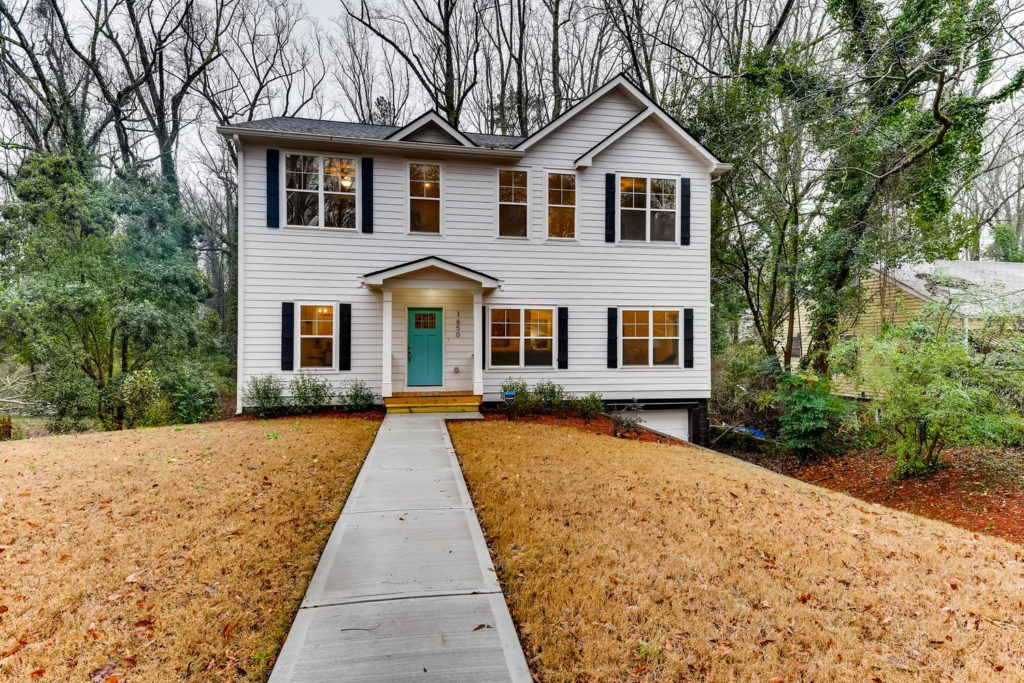 Exterior front of real estate listing - image by virtuance