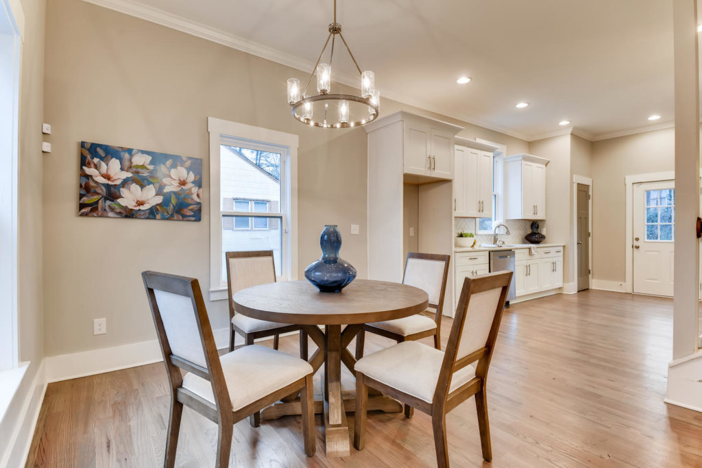 Real estate image of dining room with round table