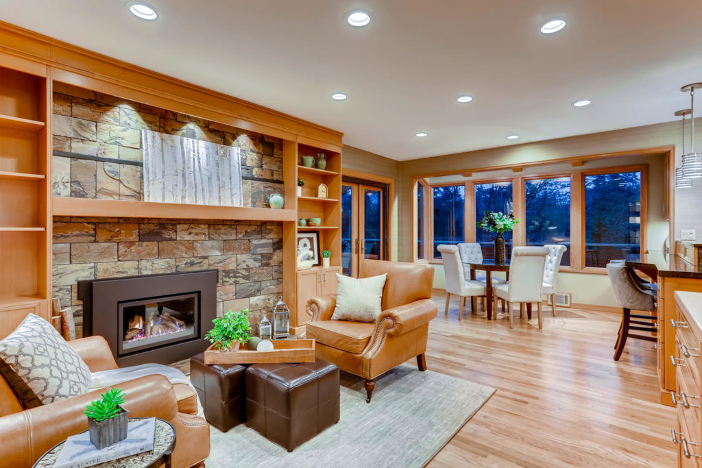 real estate image of living room with leather chairs