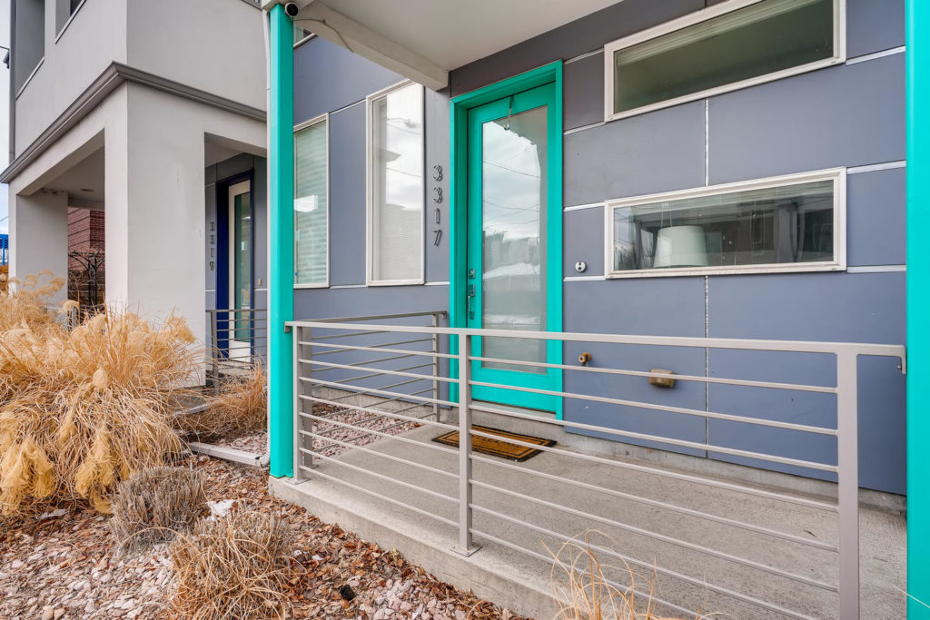 real estate image of teal door