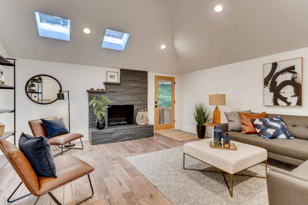 real estate image of living room with fireplace