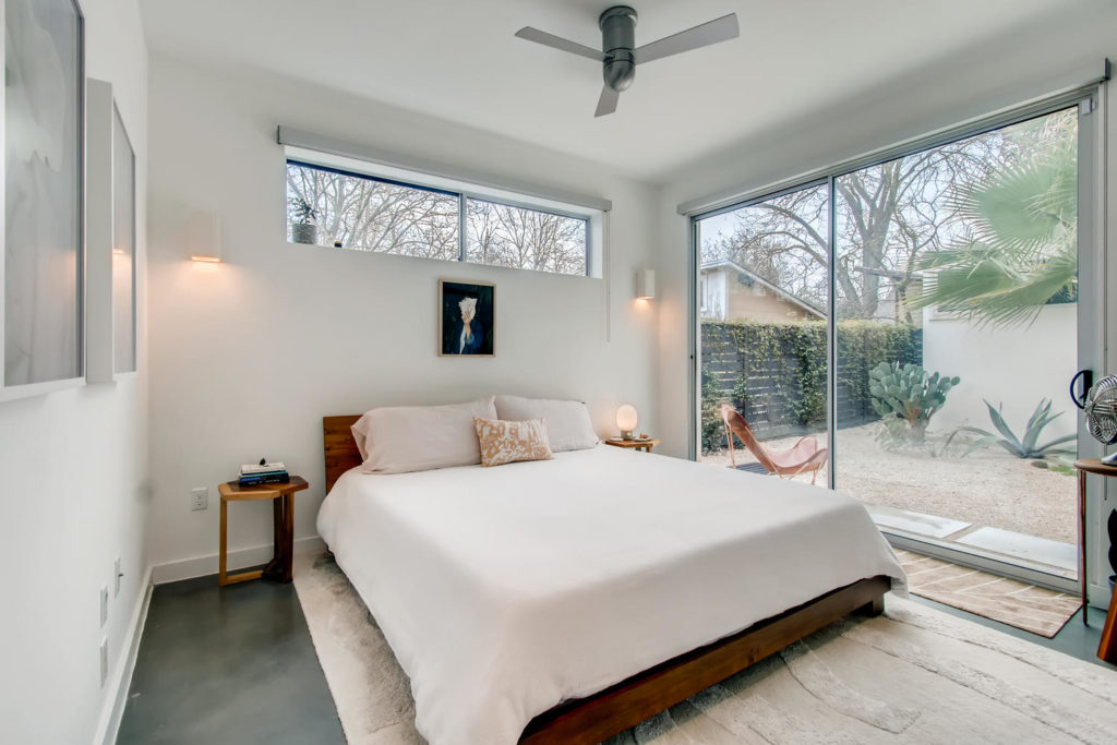 Beautiful bedroom with white duvet