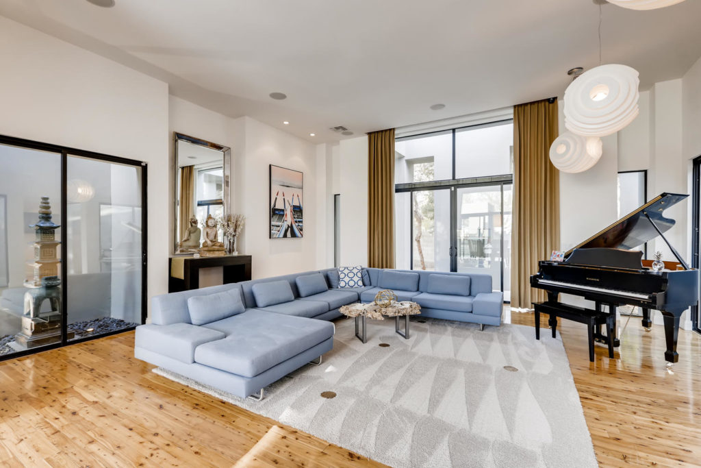 living room with large blue sectional