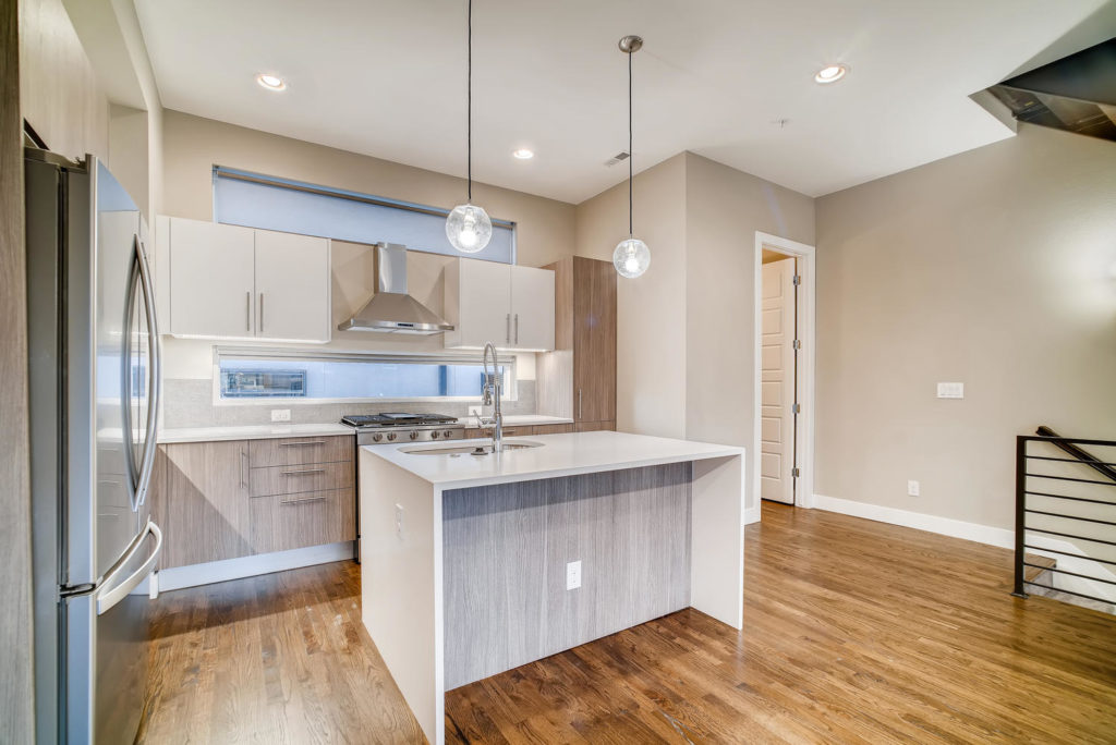 kitchen with two-toned cabinets white and wood