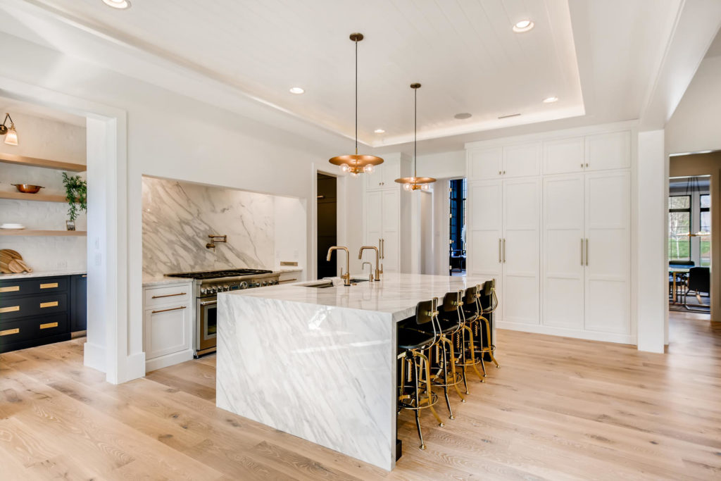 Kitchen with marble slab backsplash