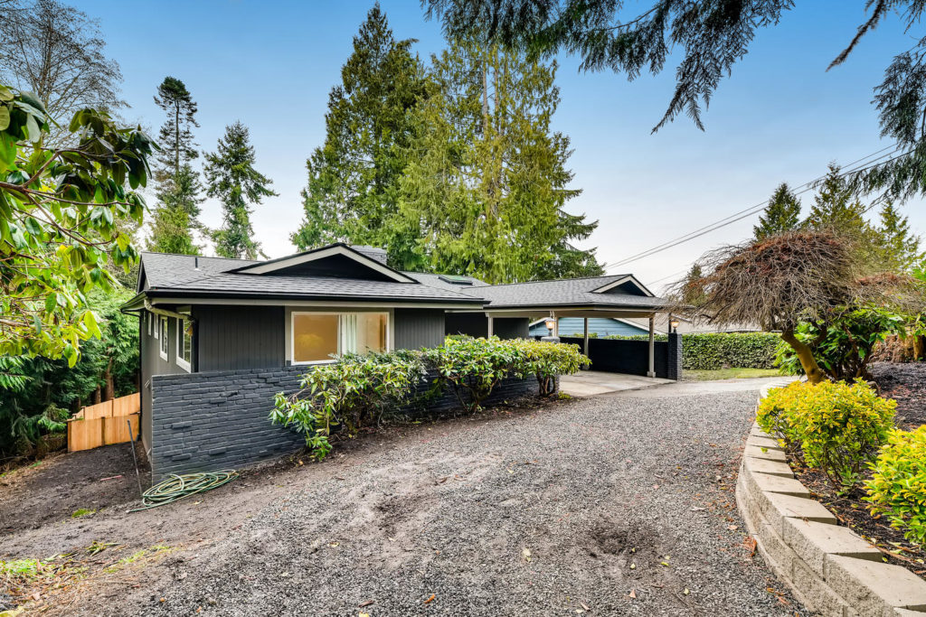 Mid-century modern home with black brick