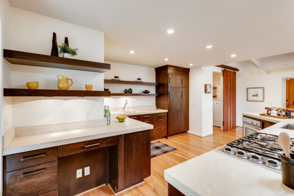 Kitchen with dark wood cabinets