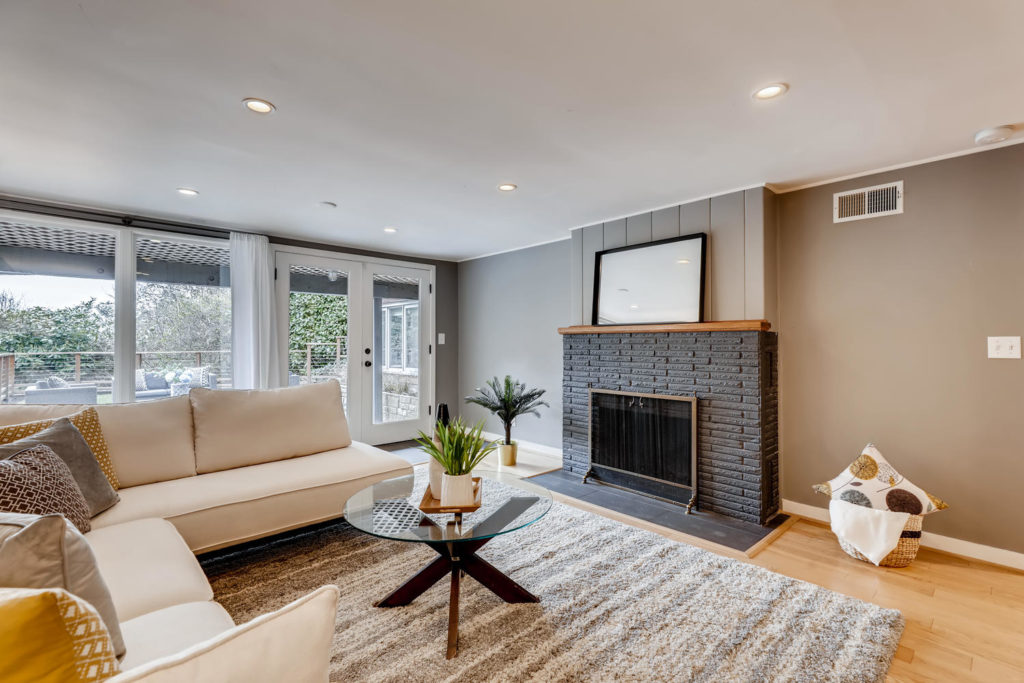 Family room with gray fireplace