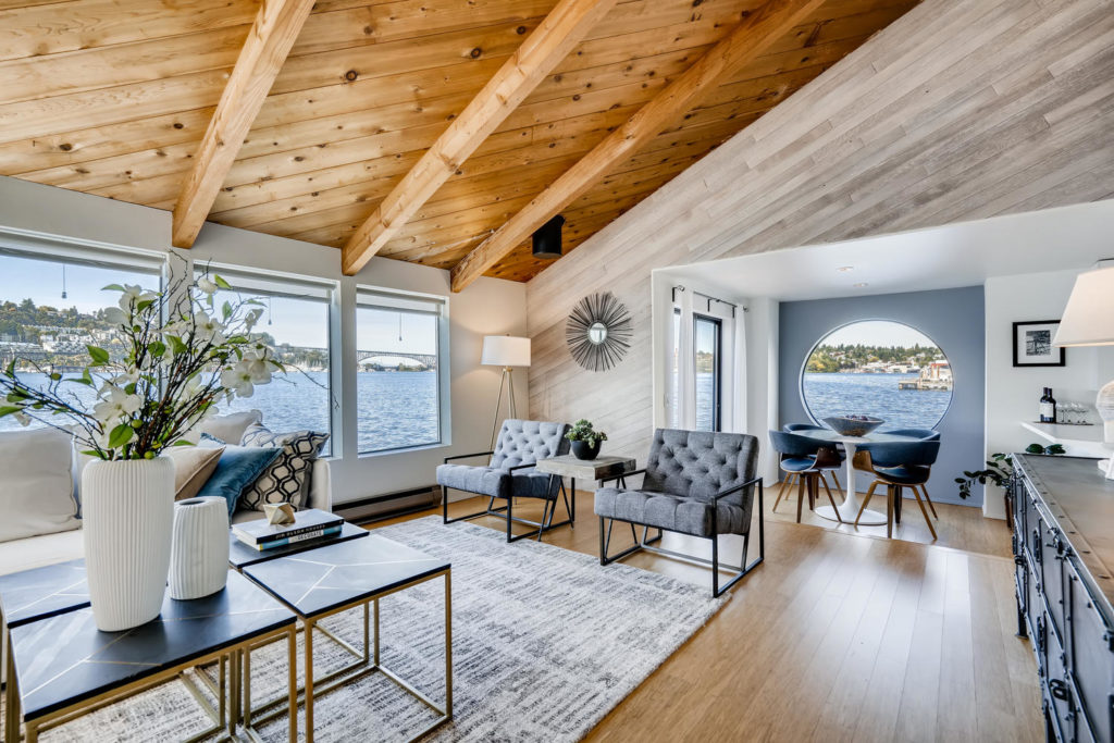 Living room with wood paneled ceilings