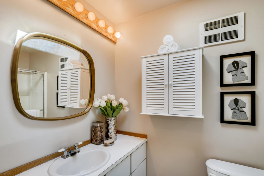 Bathroom with oval mirror