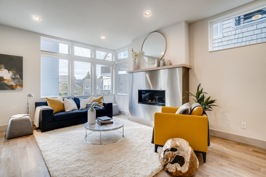 Living room with metallic fireplace