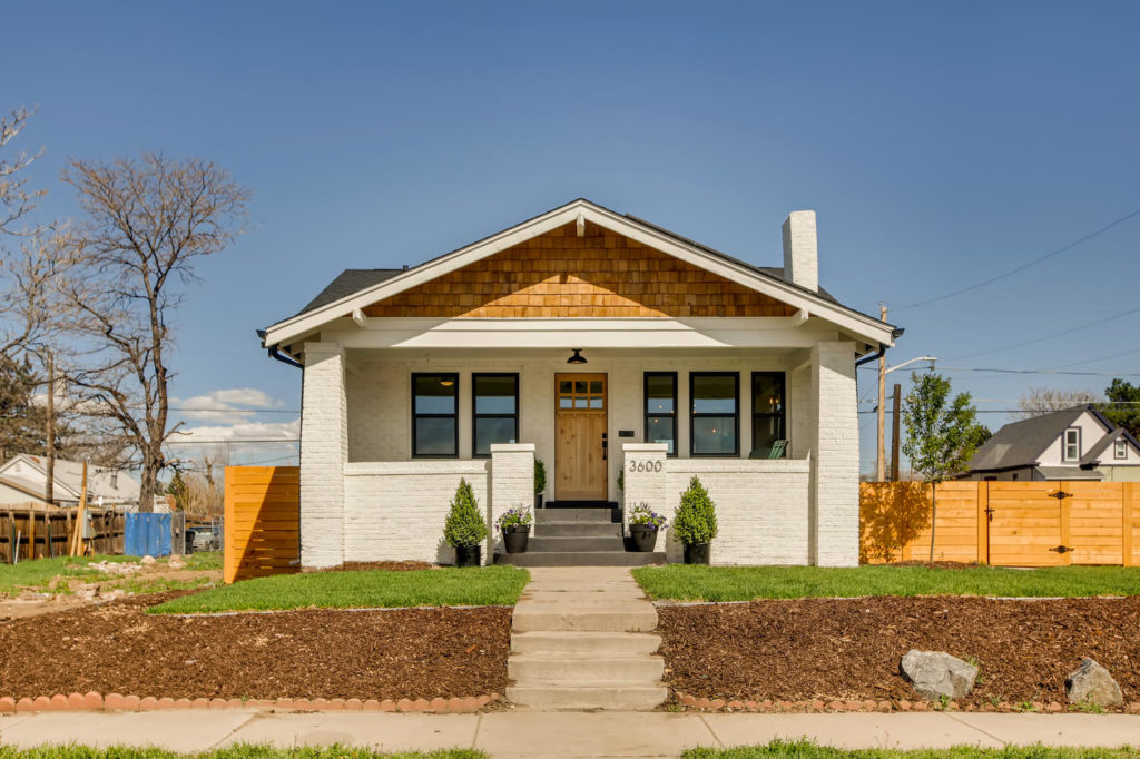Craftsman house with new fence