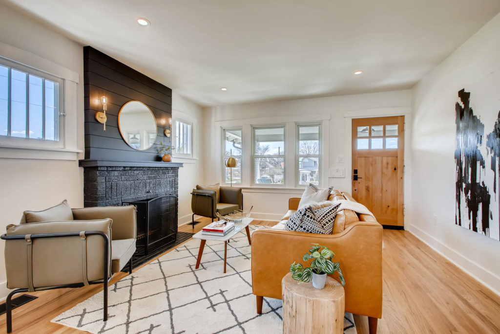 Living room with black fireplace