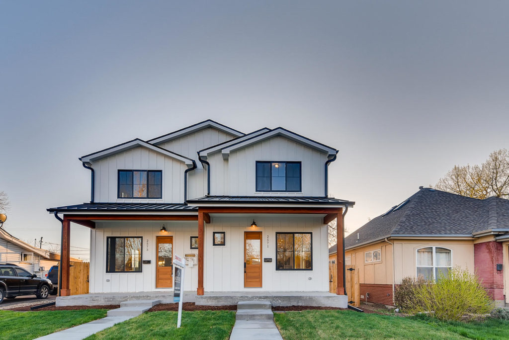 White farmhouse duplex