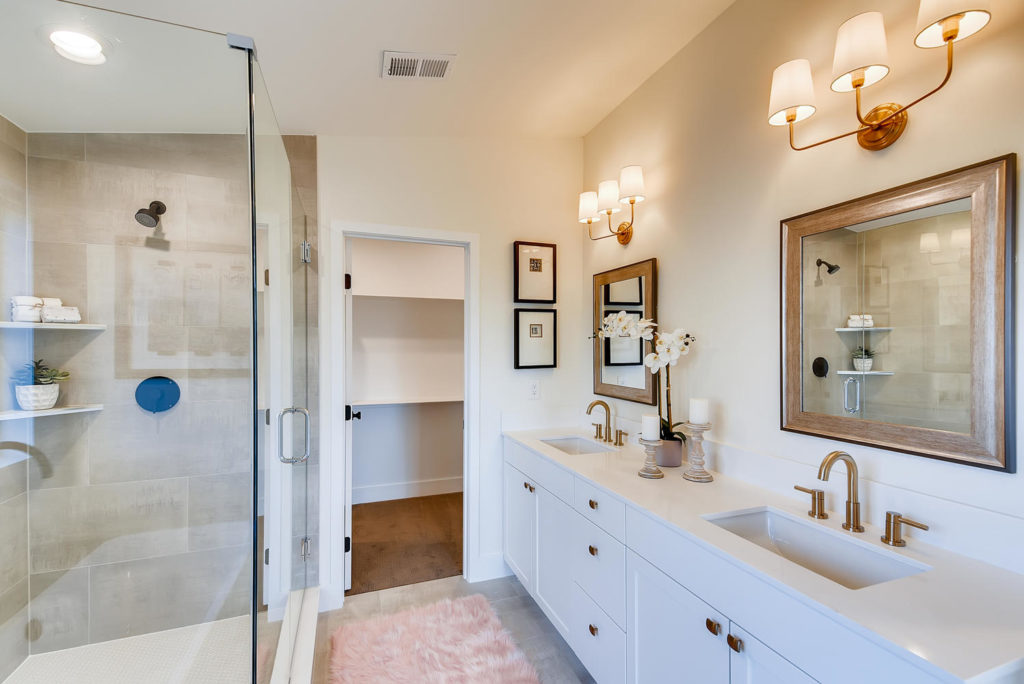 Bathroom with dual vanity and walk in shower