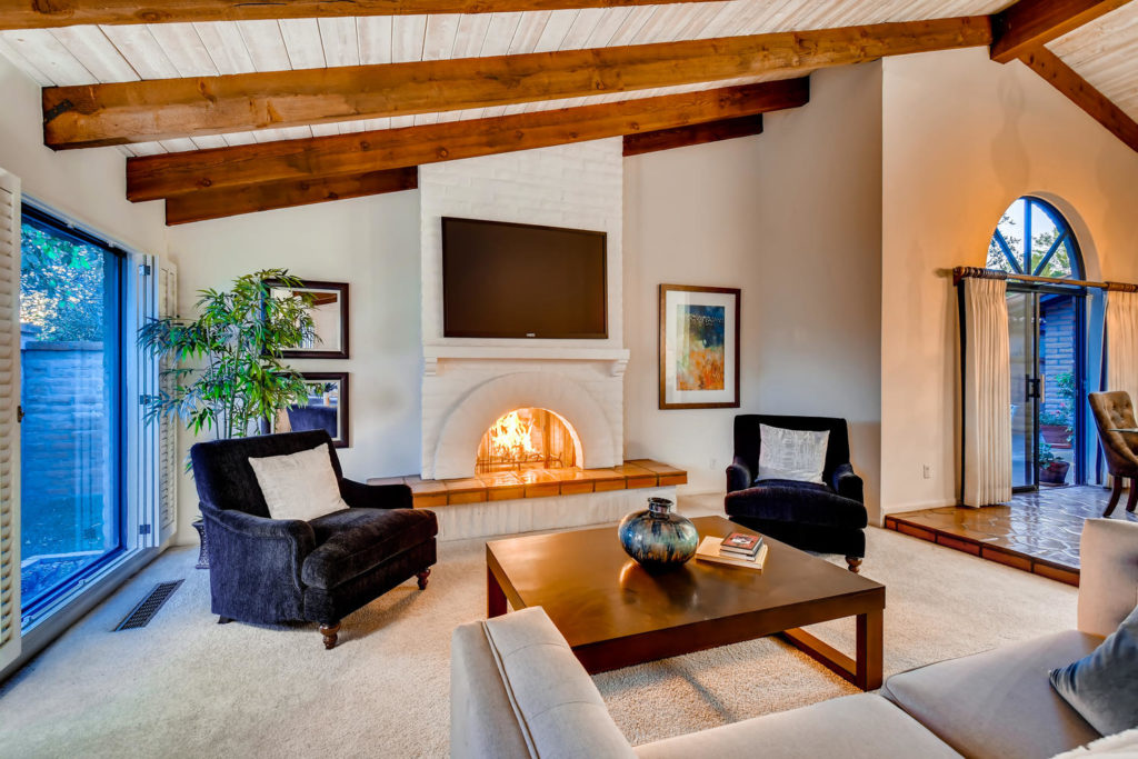 Living room in phoenix with white brick fireplace