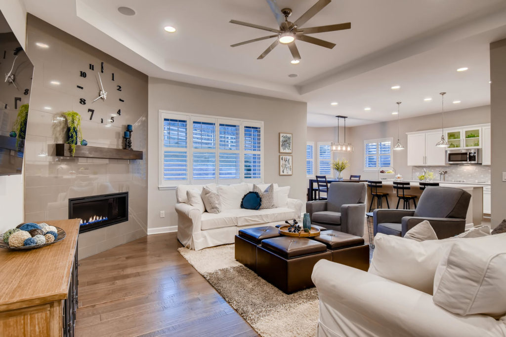 Neutral living room with fireplace feature