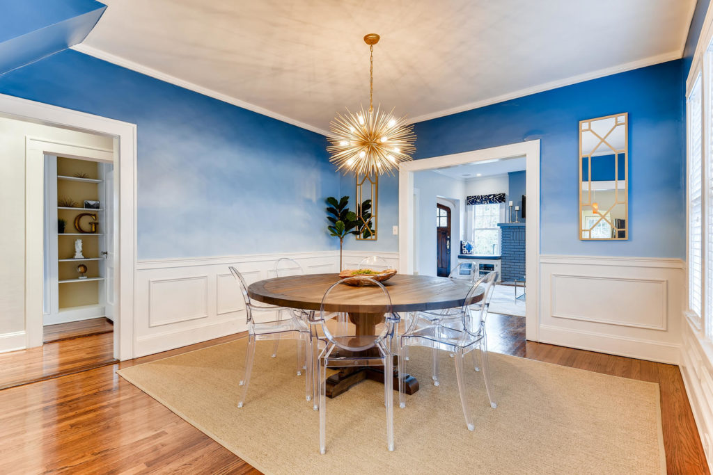 Atlanta dining room with pendant light and blue walls