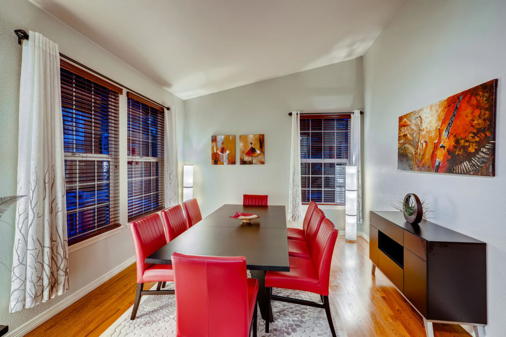 Dining room with red chairs