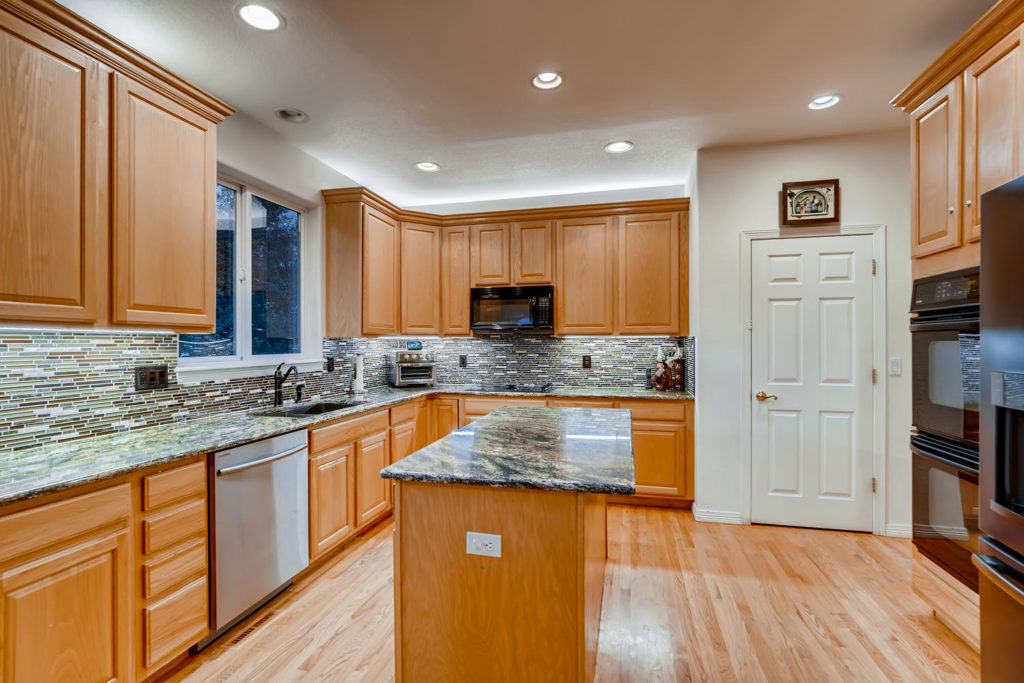 Kitchen with island and granite