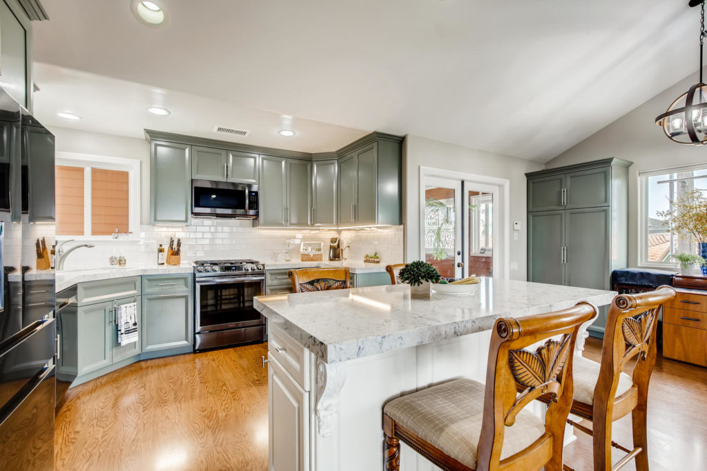 Kitchen with green cabinets