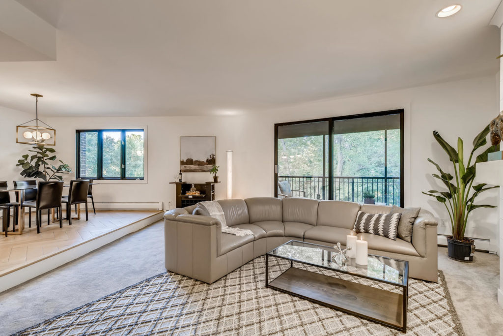 living room with large couch - real estate image