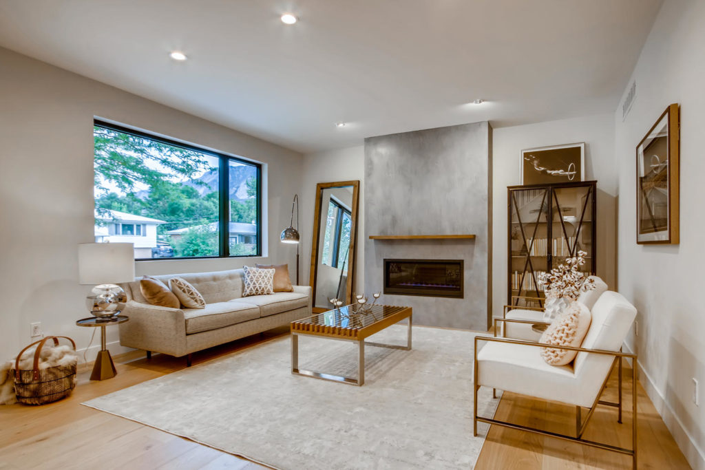 real estate photography - living room with concrete mantel