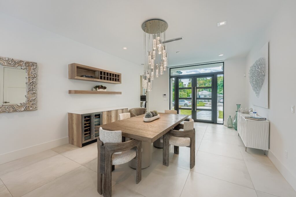 A vibrant, high-quality HDReal image of a contemporary Florida dining room.